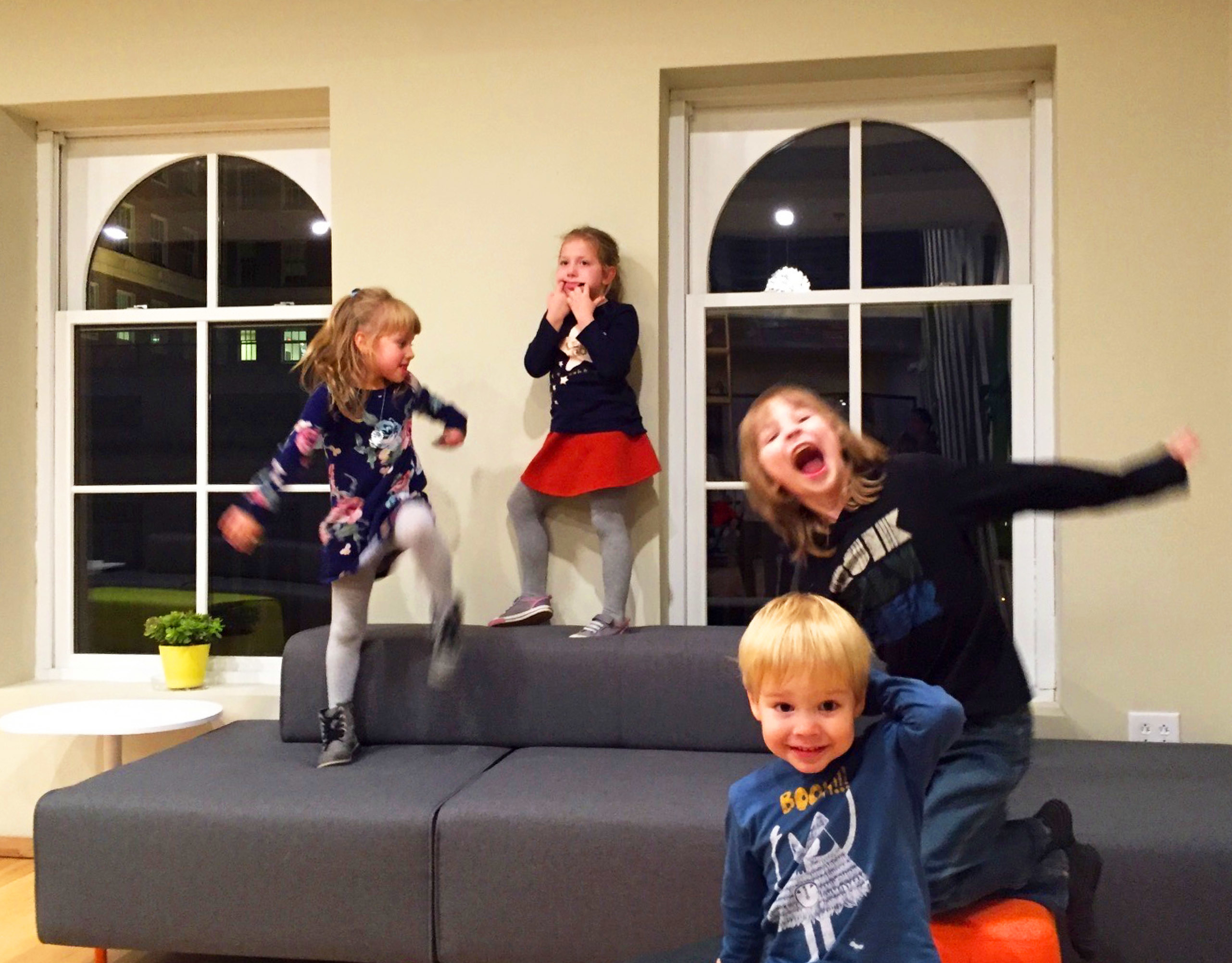 Photo of kids playing at the office. Photo of kids playing at the office.
